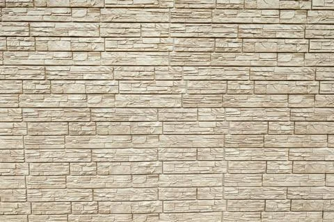 Artificial stone wall texture background Stock Photos