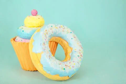 Artificial sweets made from polystyrene foam, featuring a colorful cupcake and a Stock Photos