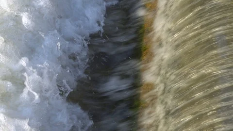 Artificial threshold height difference on the city river of green color Stock Footage 100331168