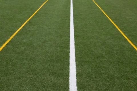 Artificial turf -  white and 2 yellow lines Stock Photos