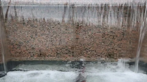 An artificial waterfall in the city park Stock Footage 50596790