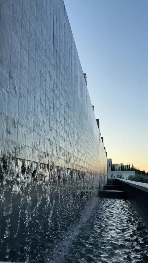 Artificial Waterfall inside the Hotel during sunset Stock Footage 231295001