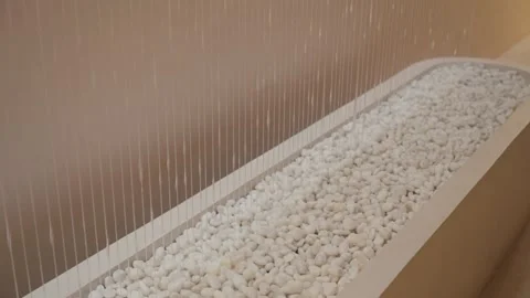 Artificial waterfall in modern minimalistic interior. Peaceful motion of water. Stock Footage 304316842