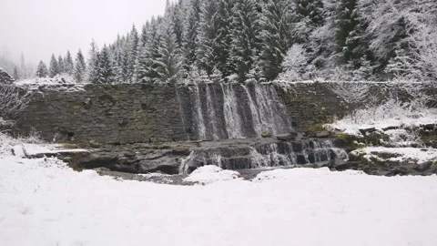 Artificial waterfall on mountain parth Stock Footage 144656514
