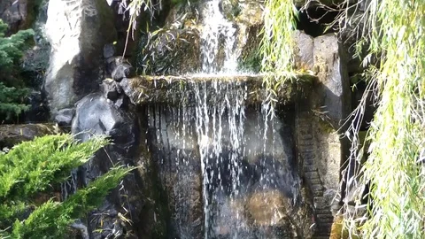 Artificial waterfall in park Stock Footage 122242617