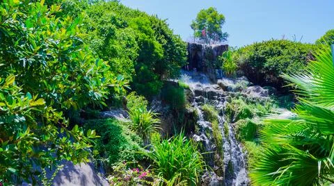 Artificial waterfall in the park. 스톡 사진