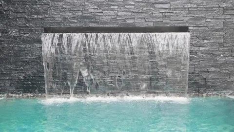 Artificial waterfall in pool 库存影片 308729703