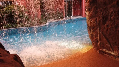 Artificial waterfall in the pool, no people. Stock Footage 106286218