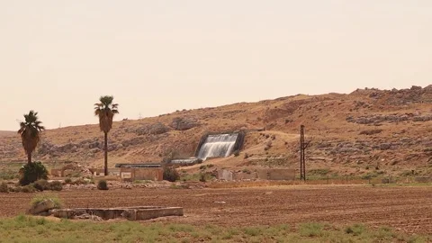 Artificial waterfall on Queiq River. Aleppo, Syria – sustainable desert design Stock Footage 320383395