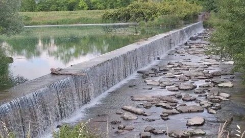 Artificial Waterfall on a River Stock Footage 309423239