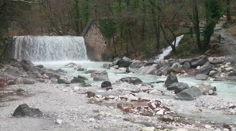 Artificial waterfall on the river Termopotamos. 4K 스톡 동영상 61775903