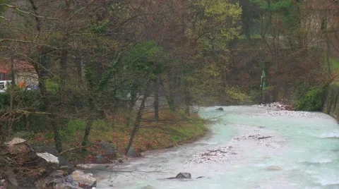Artificial waterfall on the river  Termopotamos. 4К 스톡 동영상 62026214