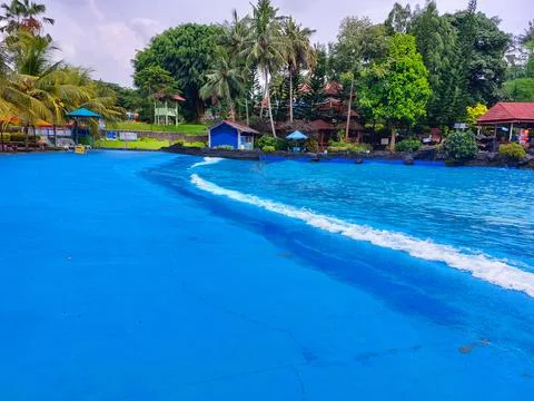 Artificial wave pool looks like a seaside beach Stock Photos
