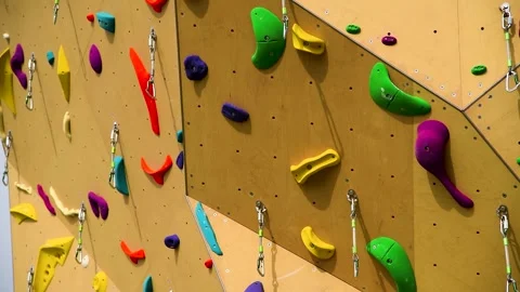 Artificial yellow climbing wall. Stock Footage 273197822