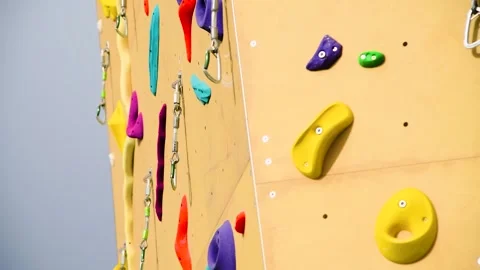 Artificial yellow climbing wall. Stock Footage 273197826
