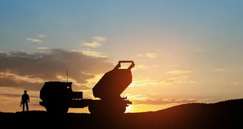 Artillery rocket system are aimed to the sky and soldier at sunset. Multiple Stock Photos
