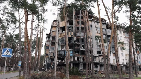 Artillery shell, Rocket hit, Scorched house Stock-Footage 246872841