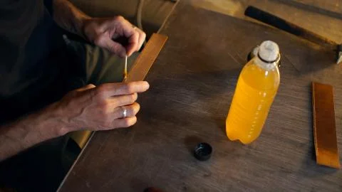 Artisan in authentic workshop. Stock Photos