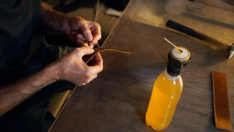 Artisan in authentic workshop. Stock Photos