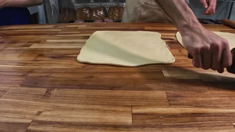 Artisan Baker Hand-Stretching Dough for Traditional Bread Making Видео 337614342