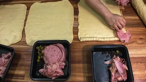 Artisan Baker Preparing Traditional Ham Bread for Baking in Professional Bakery Видео 337438651
