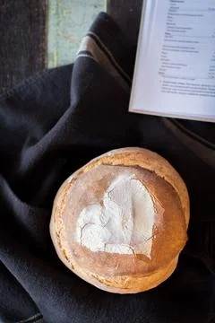 Artisan bread on black background Stock Photos