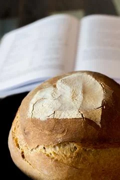 Artisan bread on black background Stock Photos