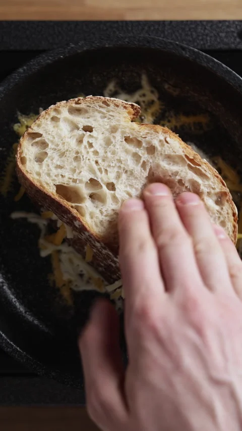 Artisan Bread With Cheese Frying In Pan Close Up Vídeo Stock 332358504