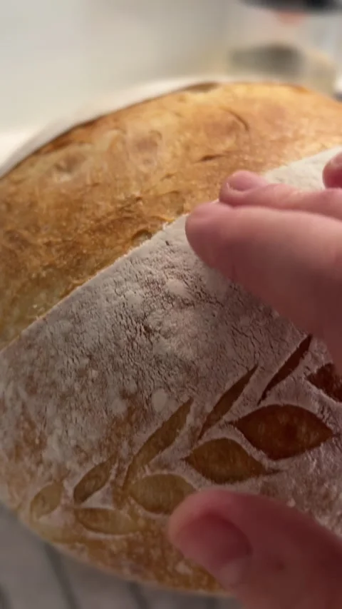 Artisan Bread Featuring Beautiful and EyeCatching Decorative Scoring Techniques Stock Footage 306079826