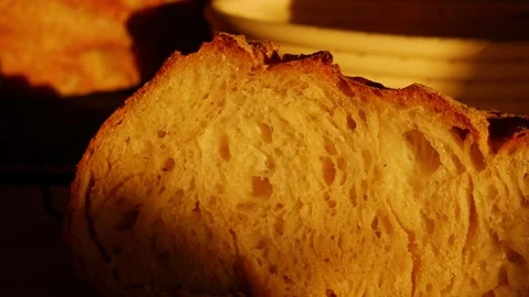 Artisan Bread Slice Close-up Showing Airy Crumb Stock Footage 329484379