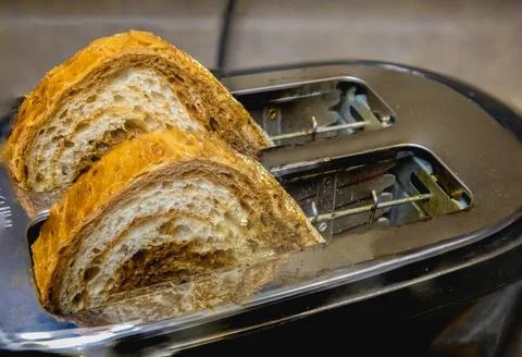 Artisan Bread Slices in Toaster Stock Photos