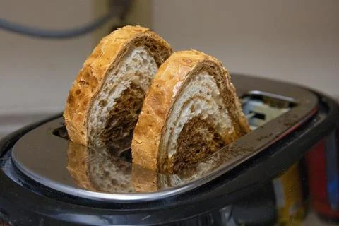 Artisan Bread Slices in Toaster 스톡 사진