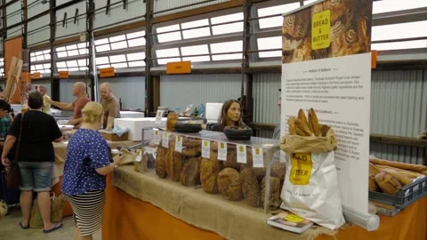 Artisan Bread Stall with Shoppers and Vendors at Indoor Sydney Market, Australia Stock Footage 345803789