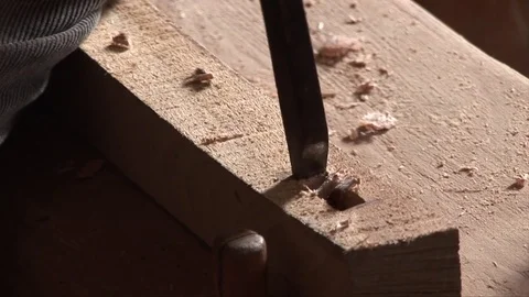 Artisan carpenter at work with the chisel Stock Footage 75305583