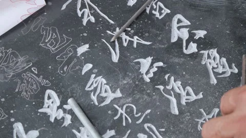 Artisan Carving Chinese Calligraphy using Ink Preserving Stone Technique Stock Footage 338243343