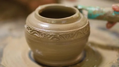 Artisan Carving Intricate Patterns on Clay Pot in Nonthaburi Thailand Stock Footage 341667296