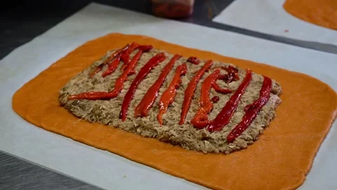 Artisan chef kneading orange dough for gallego empanada Stock-Footage 330428951