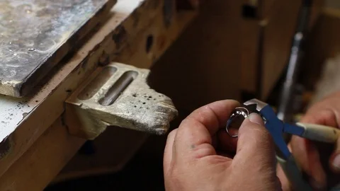Artisan Cutting and Resizing Silver Ring Video stock 96540923