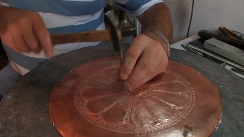 Artisan doing traditional copper craft in Sarajevo old city center Bascarsija Stock Footage 94043735