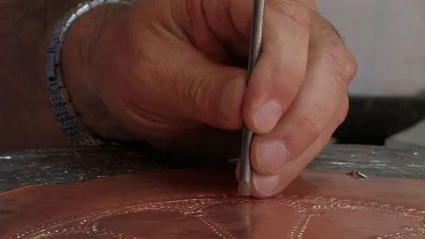 Artisan doing traditional copper craft in Sarajevo old city center Bascarsija Stock Footage 94043744