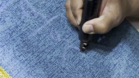 Artisan Engraving Arabic Calligraphy on Prayer Mat Using Stock Footage 332298536