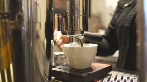 Artisan Espresso Brewing with Digital Weight Scale and White Cup at Stock Footage 336531045