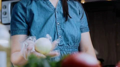 Artisan fine dining angle: cutting beef into pieces for stewing Stock Photos