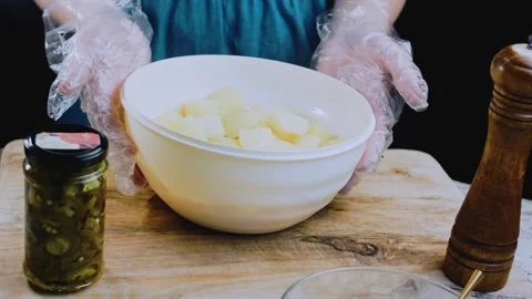 Artisan fine dining angle: garnishing the salad with crisp toppings Stock Footage 342198747