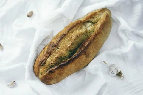 Artisan, garlic bread on a white backround. Stock Photos