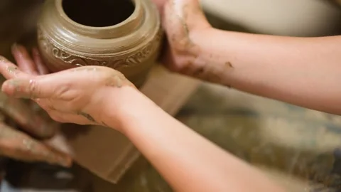 Artisan Hands Removing Handcrafted Clay Pot From Pottery Wheel Stock Footage 341456917