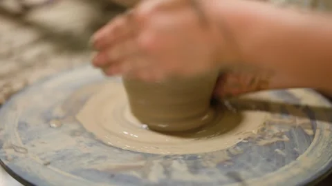 Artisan Hands Shaping Clay Pot on Spinning Pottery Wheel Stock Footage 341301537