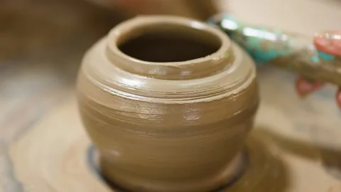 Artisan Hands Shaping Clay Pot on Spinning Pottery Wheel Stock Footage 341644512