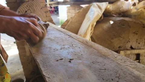 Artisan Kneading and Shaping Clay in a Traditional Workshop 스톡 동영상 348262002