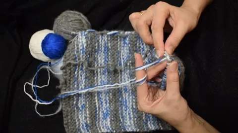 Artisan Knitting Process with Natural Wool Stock Footage 328305585